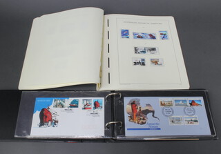 An album of Australian Antarctic first day covers and a collection of Australian Antarctic Territory mint stamps  