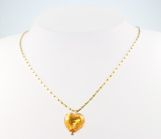 An 18ct yellow gold necklace 42cm, 4.3 grams with a heart shaped pendant and a pair of ditto earrings, gross weight all together 12.5 grams  