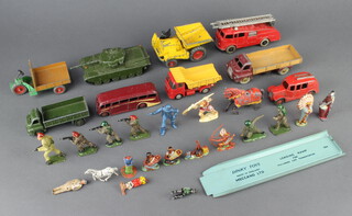 A Dinky fire engine no.555, a Dinky luxury coach and other Dinky toy model cars 