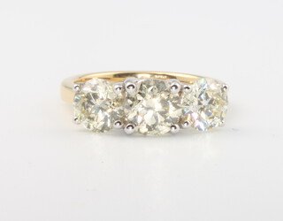 An 18ct yellow gold 3 stone diamond ring, approx. 3.4ct, 4.8 grams, size N, with WGI certificate