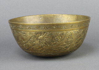 A Japanese bronze bowl with Grecian key and dragon decoration, the base with seal back 9cm h x 20cm diam.  