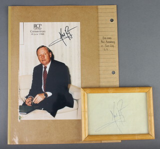 Neil Armstrong, A section of white lined paper signed by Neil Armstrong, the signature was obtained by the vendor at a convention held at Sun City South Africa 1988 8cm x 11cm, together with a colour publicity photograph with facsimile signature and marked RCM Group Convention, 18th June 1988 20cm x 12cm  