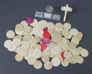 A 19th Century ivory octagonal dice, eight 3cm white bone game counters, 23 ditto 3cm counters and other counters 