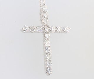 An 18ct white gold 16 stone diamond cross pendant and chain, chain 44cm, total diamond weight 2.23ct, the cross is 34mm, 6.2 grams 