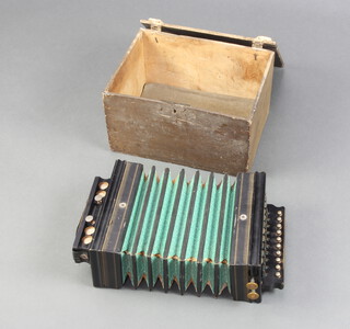 The Gem Melodeon accordion, contained in a pine box 