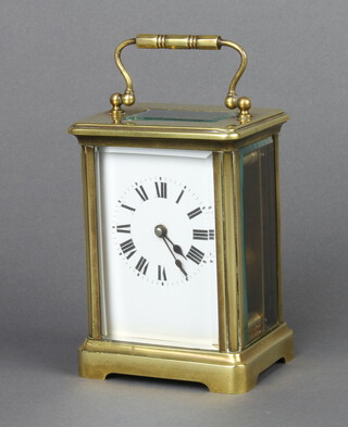 A 19th Century French 8 day carriage timepiece with enamelled dial contained in a gilt case 11cm x 8cm x 6cm (no key) 
