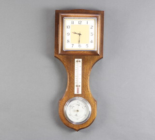 Garrard, a timepiece and barometer, the upper section with Garrard timepiece with square silvered dial and Arabic numerals above an aneroid barometer, contained in an oak stylised wheel shaped case 48cm x 19cm 