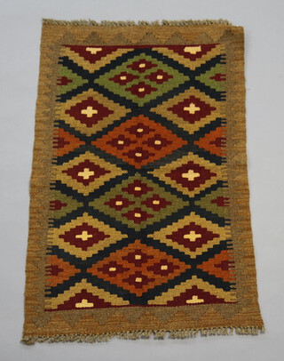 A brown, black and green ground Maimana Kilim rug with overall geometric design 94cm x 61cm 