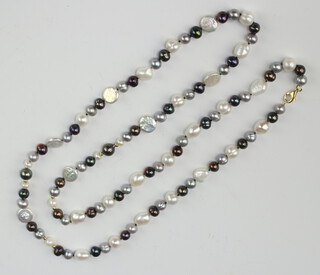 A string of baroque and 3 colour cultured pearls 96cm  
