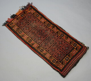 An Afghan saddle bag formed of 14 squares with multi row border 120cm x 57cm 