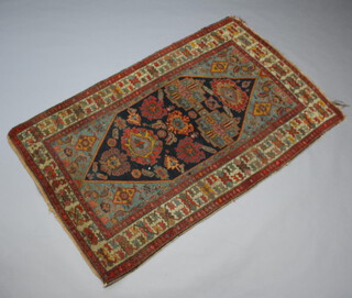 A brown and red ground striped rug 172cm x 115cm 