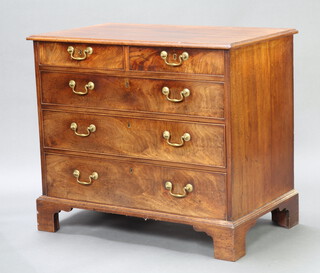 A Georgian bleached mahogany chest of 2 short and 3 long drawers with brass swan neck drop handles, raised on bracket feet 81cm h x 59cm w x 56cm d 