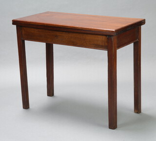 A rectangular Georgian mahogany tea table raised on square supports 72cm h x 91cm w x 45cm d 