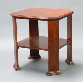 A 1920's Art Deco octagonal 2 tier mahogany occasional table raised on club supports 68cm h x 67cm w x 60cm d 