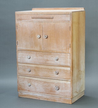Browman Brothers Ltd., an Art Deco limed oak tallboy with raised back, fitted a shallow drawer above double cupboard enclosed by panelled doors, above 3 drawers 120cm h x 81cm w x 46cm d 
