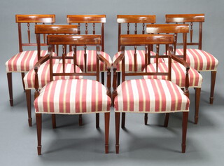 Maple & Co, a set of 8 Georgian style inlaid mahogany stick and bar back dining chairs with turned and reeded columns, over stuffed seats, raised on square tapered supports comprising 6 standard 81cm h x 50cm w x 40cm d (seat 34cm x 33cm)  and 2 carvers 84cm h x 56cm w x 46cm d (seat 44cm x 40cm)  