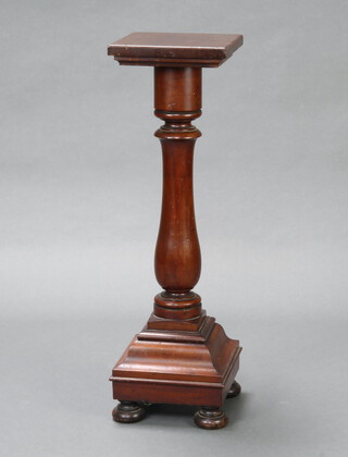 A Victorian square mahogany pedestal, raised on turned column with shaped base and bun feet 80cm h x 23cm w x 23cm d 