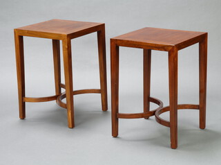 A pair of Georgian style square mahogany lamp tables, raised on tapered supports with C shaped stretchers 61cm h x 43cm w x 43cm d 