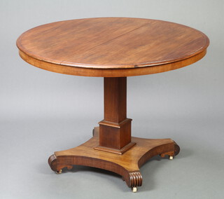 A Regency circular mahogany snap top table, raised on a square column with triform base 75cm h x 107cm diam. 