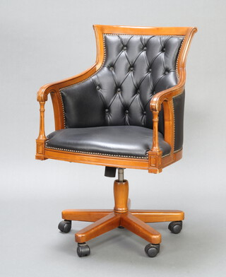 A 19th Century style show frame mahogany revolving office chair upholstered in black material 97cm h x 59cm w x 57cm d (seat 42cm w x 39cm d) 