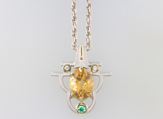 A gem set silver pendant and chain 