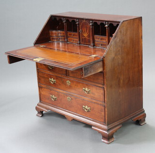 A Georgian mahogany bureau, the fall front revealing a well fitted interior with pigeons holes, secret drawers etc, above 1 long, 2 short and 2 long drawers with replacement swan neck handles, raised on ogee bracket feet 103cm h x 96cm w x 52cm d 