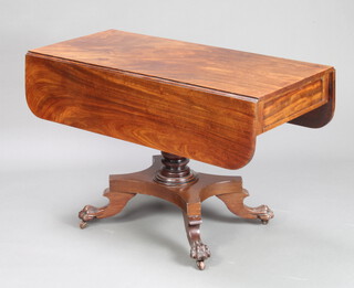 A William IV mahogany pedestal Pembroke table fitted a drawer, raised on a turned column and triform base with paw feet 72cm h x 111cm w x 49cm when closed x 101cm when open