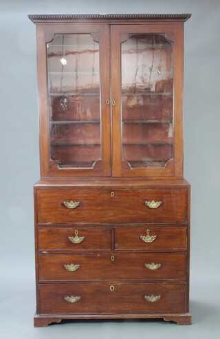 A Georgian mahogany secretaire bookcase with moulded and dentil cornice, fitted adjustable shelves enclosed by glazed panelled doors,  the base fitted a secretaire drawer with pigeon holes and drawers, above 2 short and 2 long drawers with replacement brass handles, raised on bracket feet 226cm h x 118cm w x 51cm 