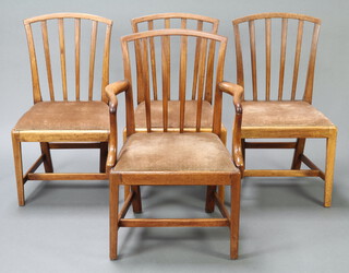 A set of 4 Georgian mahogany stick and rail back dining chairs comprising 1 carver 90cm h x 56cm w x 46cm d (seat 34cm x 30cm, old repair to the arm), 3 standard chairs 87cm h x 50cm w x 39cm d (seats 37cm x 27cm) with upholstered drop in seats, raised on square supports 
