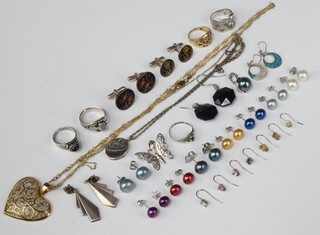 Two pair of silver earrings, minor cultured pearl studs, 2 silver rings, a pair of earrings, 4 single earrings, a silver gilt pendant and chain and 2 pairs of cufflinks etc