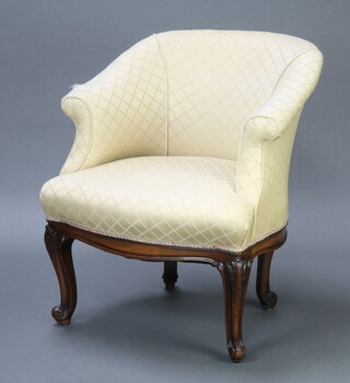 An Edwardian tub back armchair upholstered in white material, raised on cabriole supports 79cm h x 50cm w x 64cm d (seat 27cm x 37cm) 