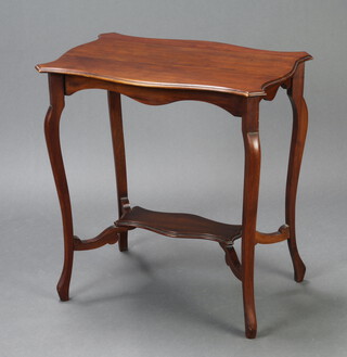 An Edwardian shaped mahogany 2 tier occasional table, raised on cabriole supports 70cm h x 68cm w x 45cm d 
