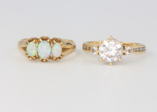 An 18ct yellow gold Victorian opal ring, size M 1/2, 3.7 grams together with an 18ct yellow gold paste ring 3.2 grams size P 