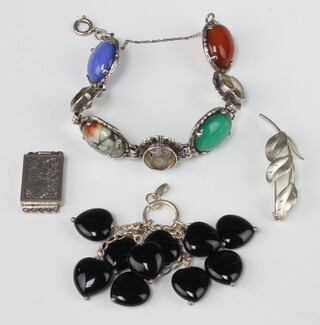 A silver hardstone bracelet, a brooch, clasp and pendant 