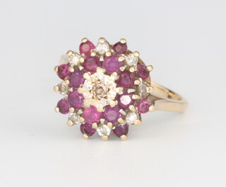 A 9ct yellow gold amethyst and gem set ring 3.5 grams, size N 