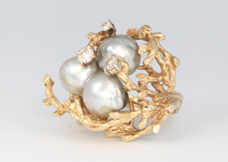 A vintage yellow metal grey baroque pearl and diamond ring, diamonds 0.5ct, 17.3 grams, size N 