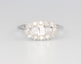 An 18ct white gold diamond cluster ring 0.5ct, 4.8 grams, size O 1/2