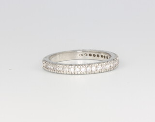 A white metal half eternity ring, 2.5 grams, size P