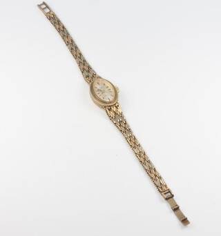 A lady's 9ct yellow gold oval Rotary wristwatch and bracelet 23.5 grams gross, including movement 