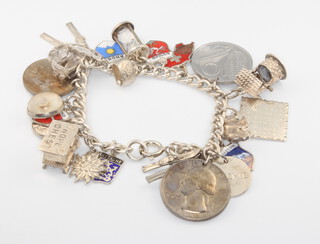 A silver charm bracelet 54 grams gross 