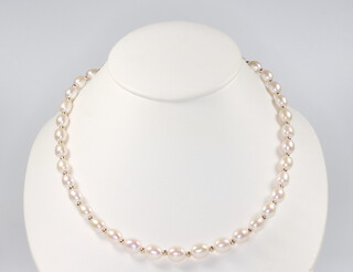 A string of oval cultured pearls with a 9ct yellow gold clasp 43cm 