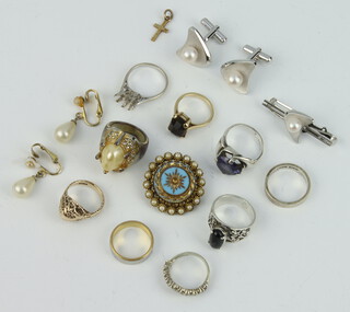 Three 9ct yellow gold gem set rings, 12 grams gross, sizes H, I, I, a 22ct gold and silver wedding band gross 5.1 grams size K 1/2, five other rings, an 18ct ring mount 3 grams and a brooch, a silver pearl dress set and a 9ct gold cross pendant together with a pair of imitation pearl clips