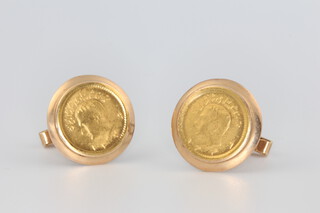 A pair of yellow metal 14k quarter pahlavi cufflinks, gross weight 13.4 grams including mounts 