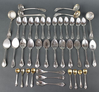 Twelve silver plated lily pattern grapefruit spoons, 11 mixed condiment spoons, 6 sifter spoons, 12 jam spoons