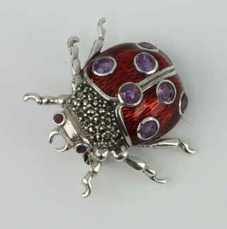 A white metal enamel ladybird brooch 3cm 