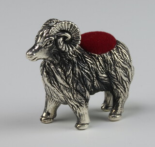 A sterling pin cushion in the form of a standing ram 3cm 