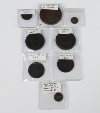 A collection of English bronze coinage including an 1807 penny, 1745 half penny, 5 others 