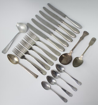 Five World War Two Third Reich German Luftwaffe issue dinner knives the blades marked Feinstahl Solingen, 5 ditto dinner forks, a tablespoon, dessert spoon, ladle, 4 tea spoons and a serving spoon  