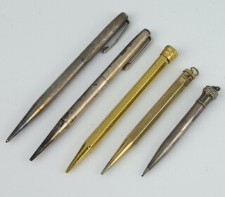 A silver yard o led propelling pencil, 1 other and 3 other propelling pencils 
