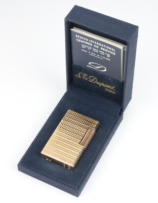 A gentleman's gold plated engine turned Dupont gas cigarette lighter boxed 6cm